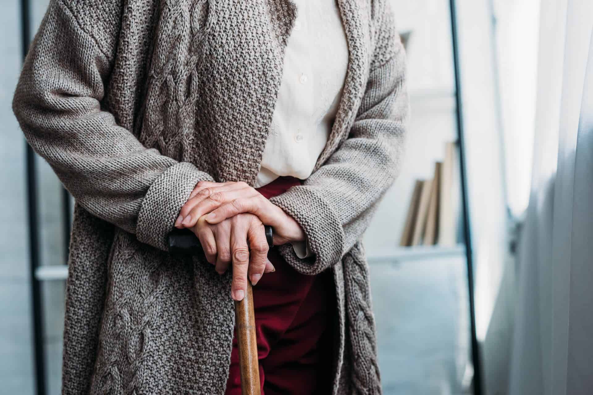 Man standing with a cane